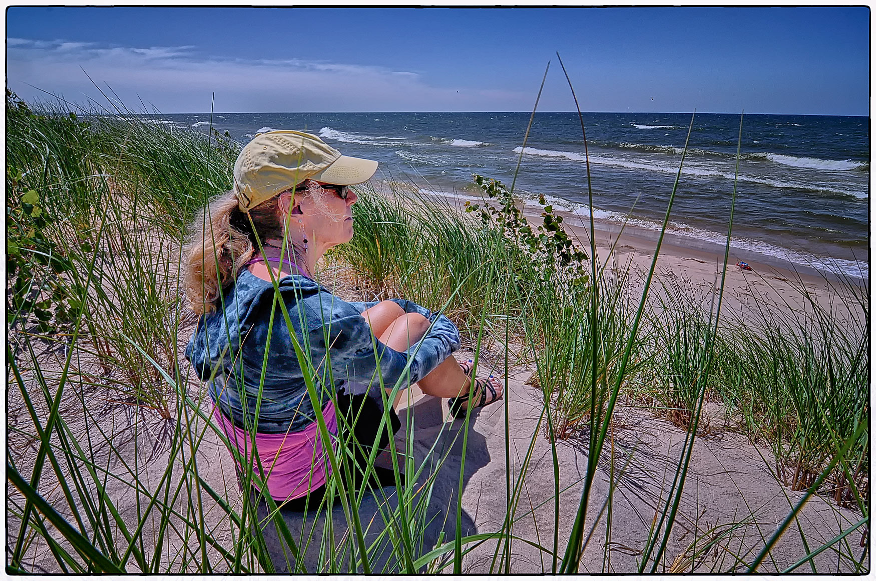 Patty sitting on a dune