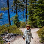 A woman hiking at Spooner Lake  