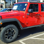A parked red Jeep