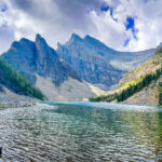 A clean lake near a mountain