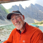 A man sailing across Agnes Lake