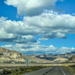 Cloudy sky above an empty road