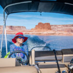 An old woman riding a paddle boat