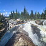 A rainbow formed because of the Athabasca Falls