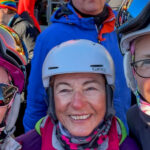 People wearing jackets and helmets