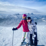 A couple enjoying skiing