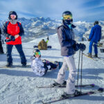 A family enjoying a ski trip