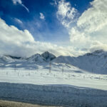 A snowy mountain and a beautiful blue sky