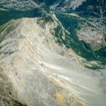 The Frank Slide with a town at the bottom of the mountain