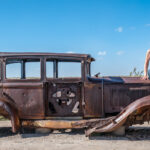 A rusted car at the Petrified Forest