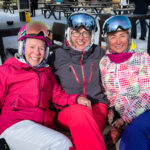 Three women at a ski cafe