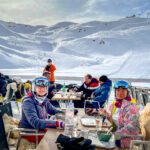 People eating at a ski cafe