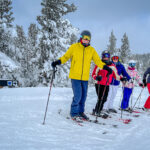 Five people in ski gear
