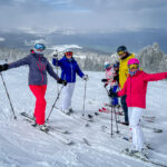 A family at a ski slope