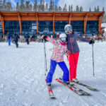 Two women on skis  