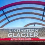 The top of the Destination Glacier sign